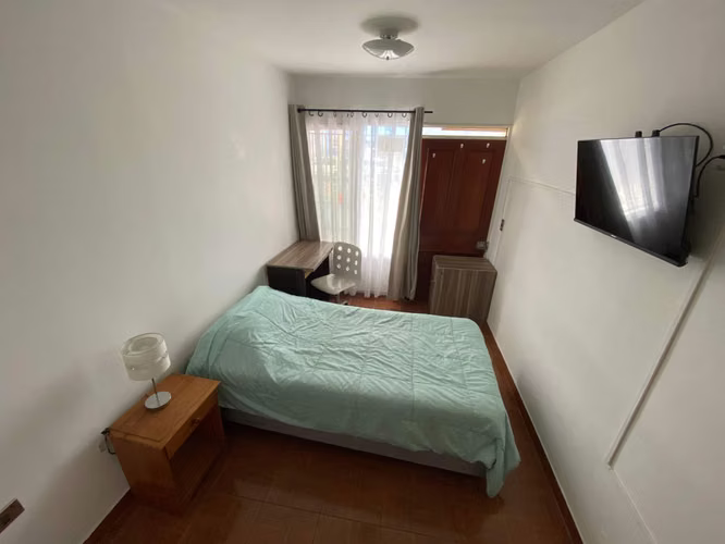 Habitación central para dama sola