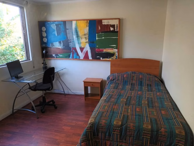 Habitación grande en condominio en La Reina